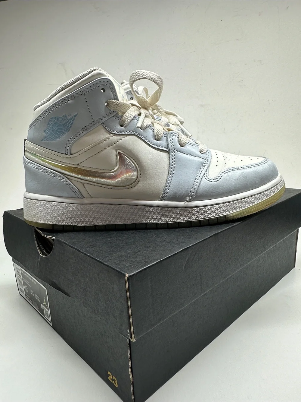 Air Jordan Kids Mid-Top Sneakers in White and Light Blue with Iridescent Swoosh